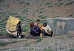 13-family_getting_water